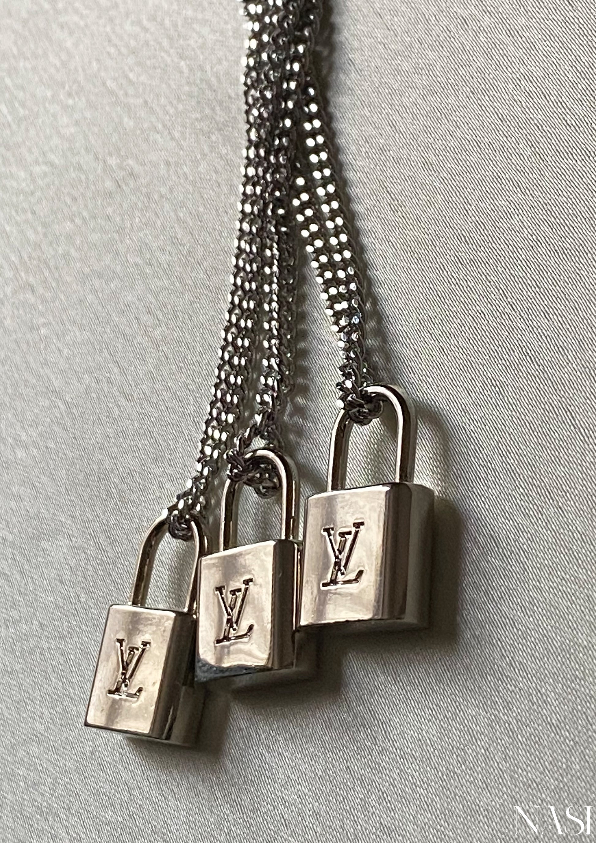 Louis Vuitton Lock & Key Necklace –